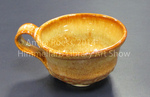 Thrown + Hand Carved Teacup by Amira A. Roess